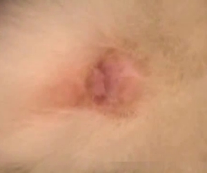 Gently applying pressure to the hole